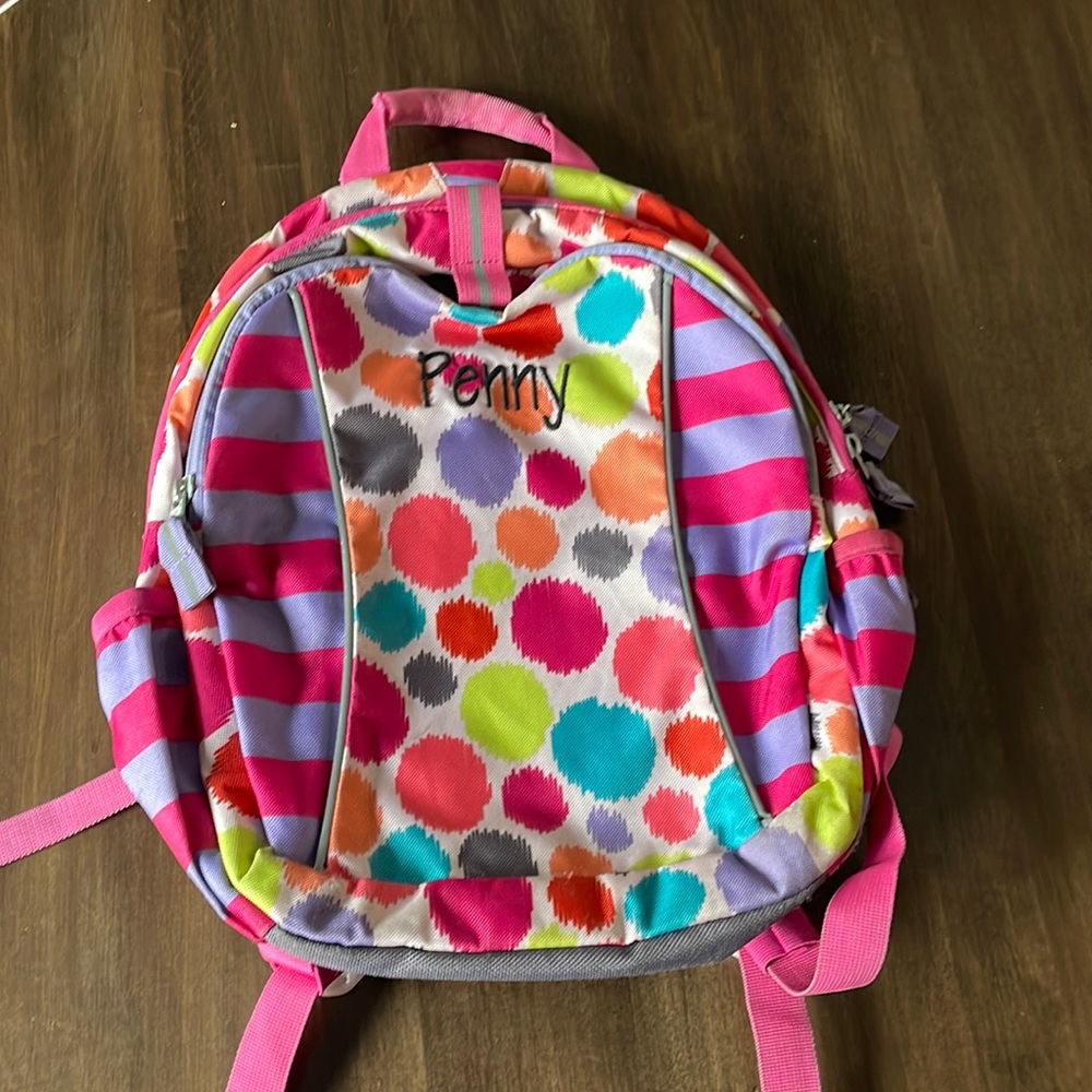 Garnet Hill preschool size backpack embroidered with the name “Penny”